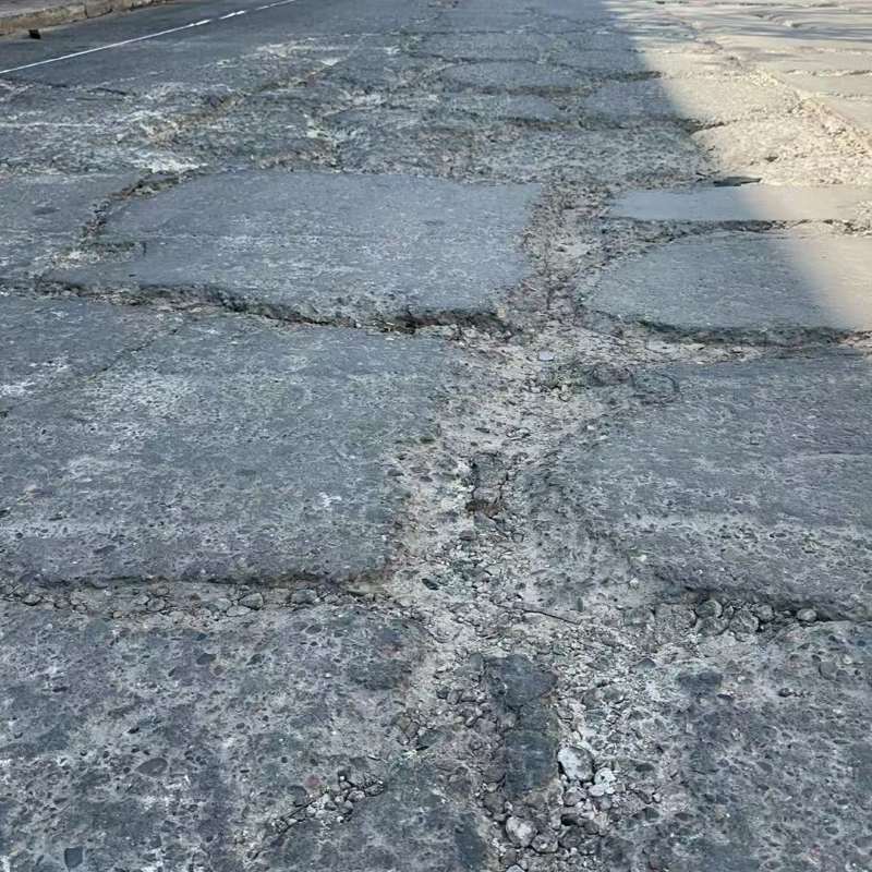 黑山路面起砂露石子修补料